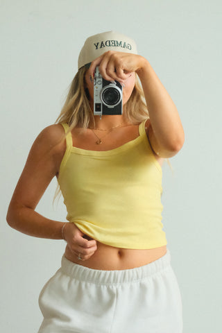 Daydreamer Yellow Bloom Solid 90’s Tanks