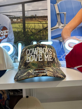 Camo “Cowboys Love Me” Trucker Hat