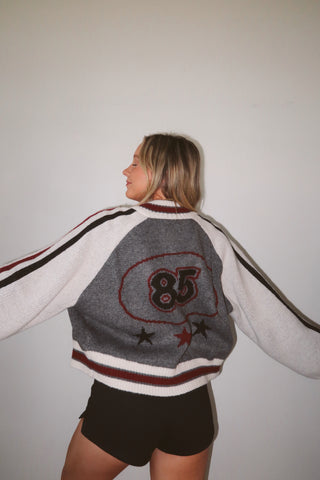 “85” Sweater With Star Accents