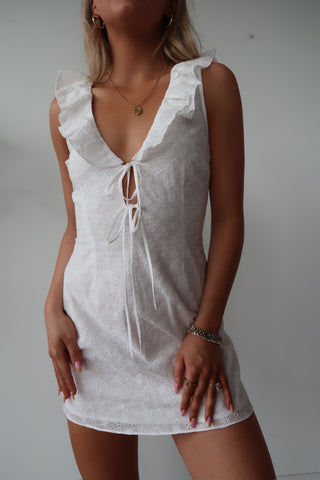 White Dress With Ruffle And Tie Detail