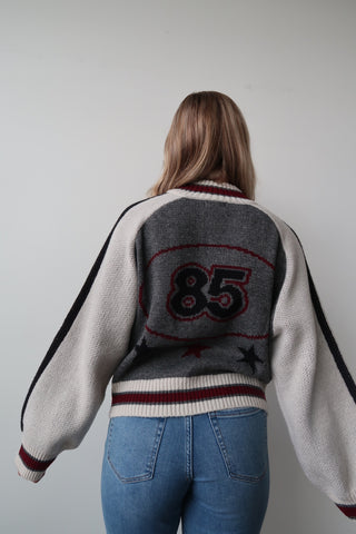 “85” Sweater With Star Accents