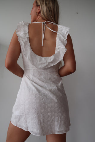 White Dress With Ruffle And Tie Detail