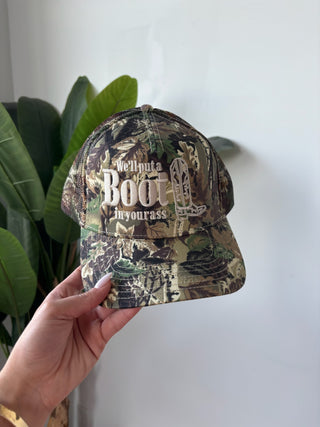 “We’ll Put A Boot In Your Ass” Camo Trucker Hat