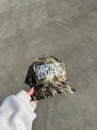Camo “Cowboys Love Me” Trucker Hat