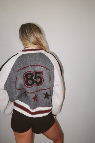 “85” Sweater With Star Accents