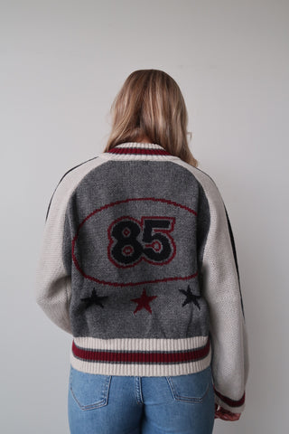 “85” Sweater With Star Accents