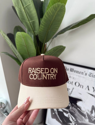 “Raised On Country” Trucker Hat