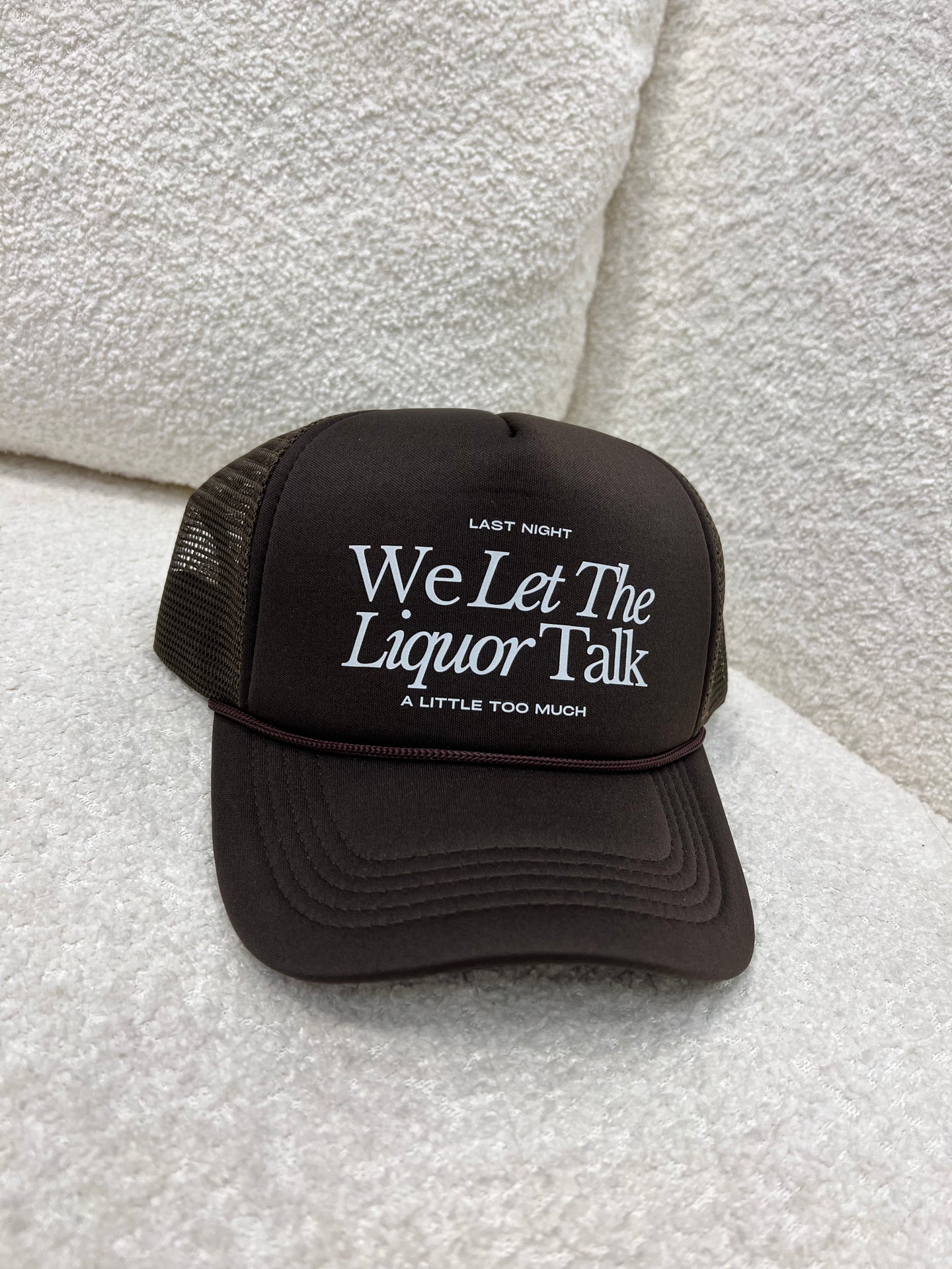 We Let The Liquor Talk Trucker Hat